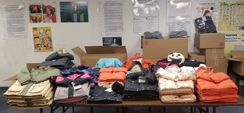 Boxes of coats, gift of the Logan Foundation